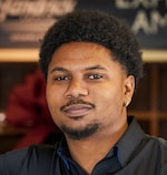 Staff member MALCOLM HINES from ID_abc456036fc8