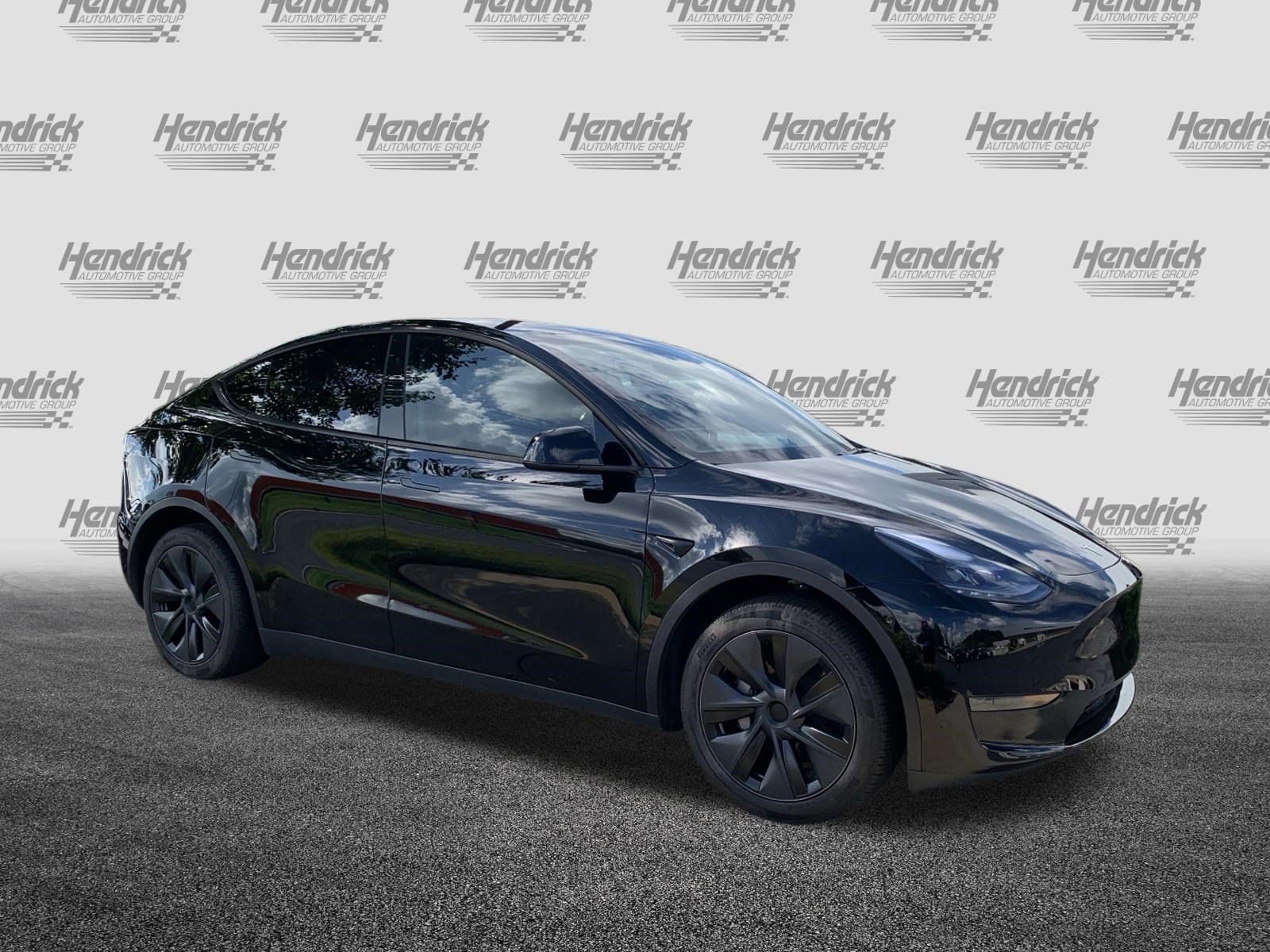Used 2025 Tesla Model Y Long Range with VIN 7SAYGDED8SA369887 for sale in Charlotte, NC