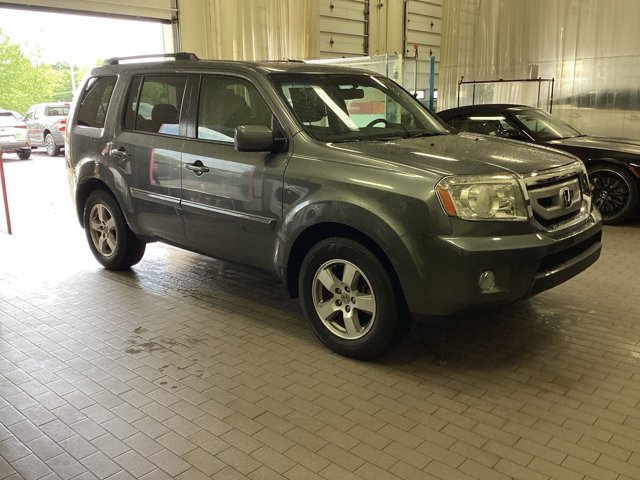 Used 2011 Honda Pilot EX-L with VIN 5FNYF4H52BB035815 for sale in Kansas City