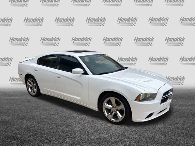 Used 2013 Dodge Charger SXT with VIN 2C3CDXHG5DH643638 for sale in Kansas City