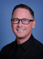 Staff member Nick Karras from ID_9a3ec96eeb73