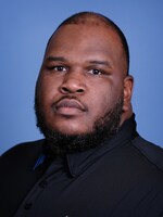 Staff member Douglas Caston from ID_8f446530d76b