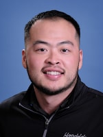 Staff member Robert Cheng from ID_a5b1854913a9