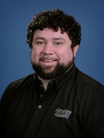 Staff member Peter Clark from ID_8f446530d76b