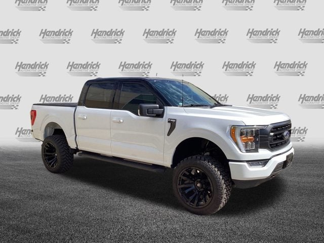 Used 2021 Ford F-150 XLT with VIN 1FTFW1E51MKE61589 for sale in Kansas City