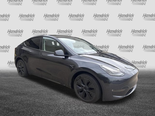 Used 2024 Tesla Model Y Long Range with VIN 7SAYGDEE4RF129080 for sale in Kansas City
