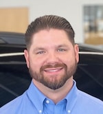 Staff member Cliff Williams from ID_22288e528bfa