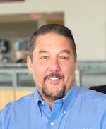 Staff member John D’Errico from ID_22288e528bfa
