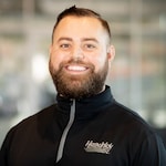 Staff member Grey Mills from ID_9686ab77f88f