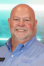 Staff member John Presley from ID_48570268a21e