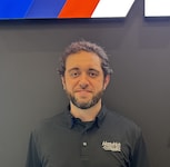 Staff member Aaron Wess from ID_45e34c94cb6e