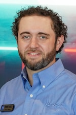 Staff member Aaron Wess from ID_45e34c94cb6e