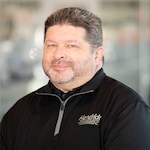 Staff member Wayne Hewitt from ID_45e34c94cb6e