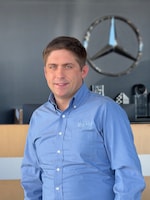 Staff member Garrett Michael from ID_142460f358c1