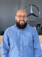 Staff member Christopher Linares from ID_ee1cb6a3817b