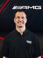 Staff member Christopher Scotti from ID_142460f358c1