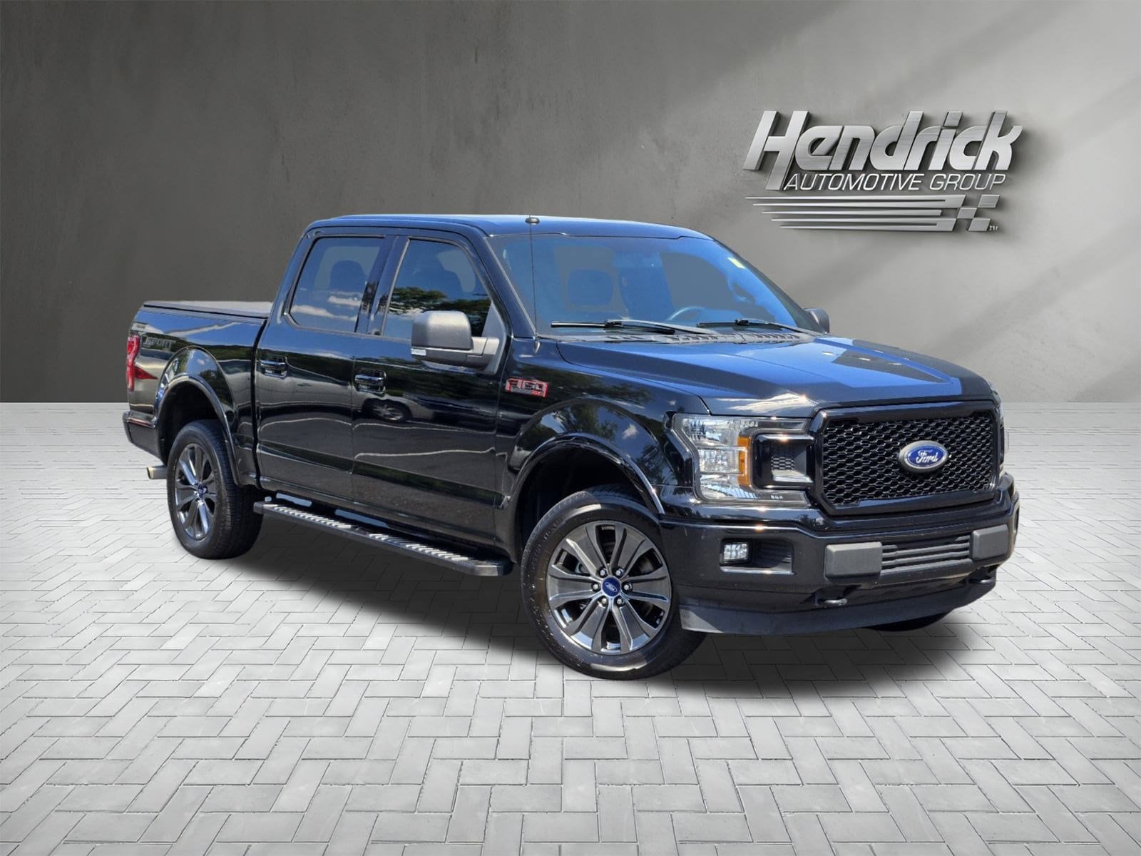 Used 2018 Ford F-150 XLT with VIN 1FTEW1E5XJFD50877 for sale in Hoover, AL