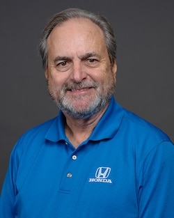 Staff member Paul John from ID_2df0f464a126