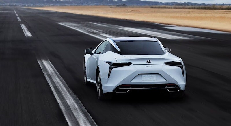 Interior of the Lexus LC Convertible shown in Circuit Red leather with Satin Metallic trim.
