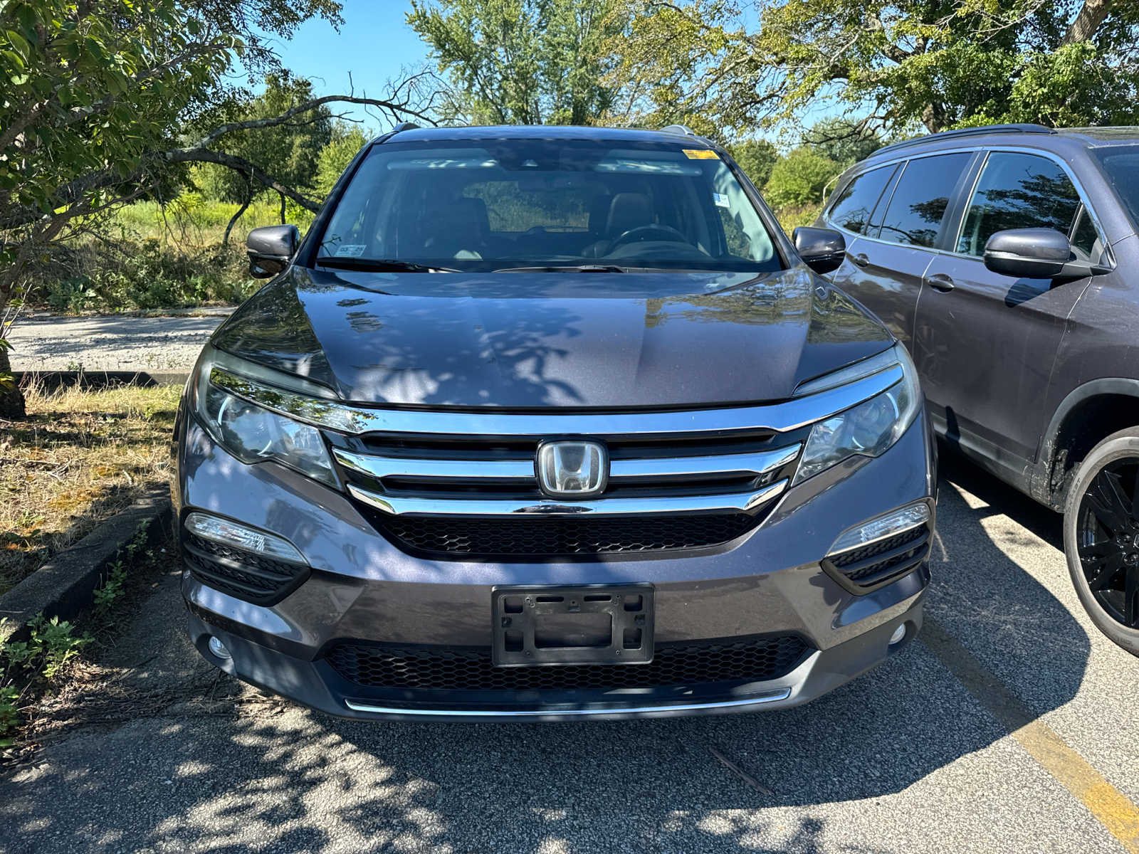 Used 2017 Honda Pilot Touring with VIN 5FNYF6H97HB089974 for sale in Boston, MA