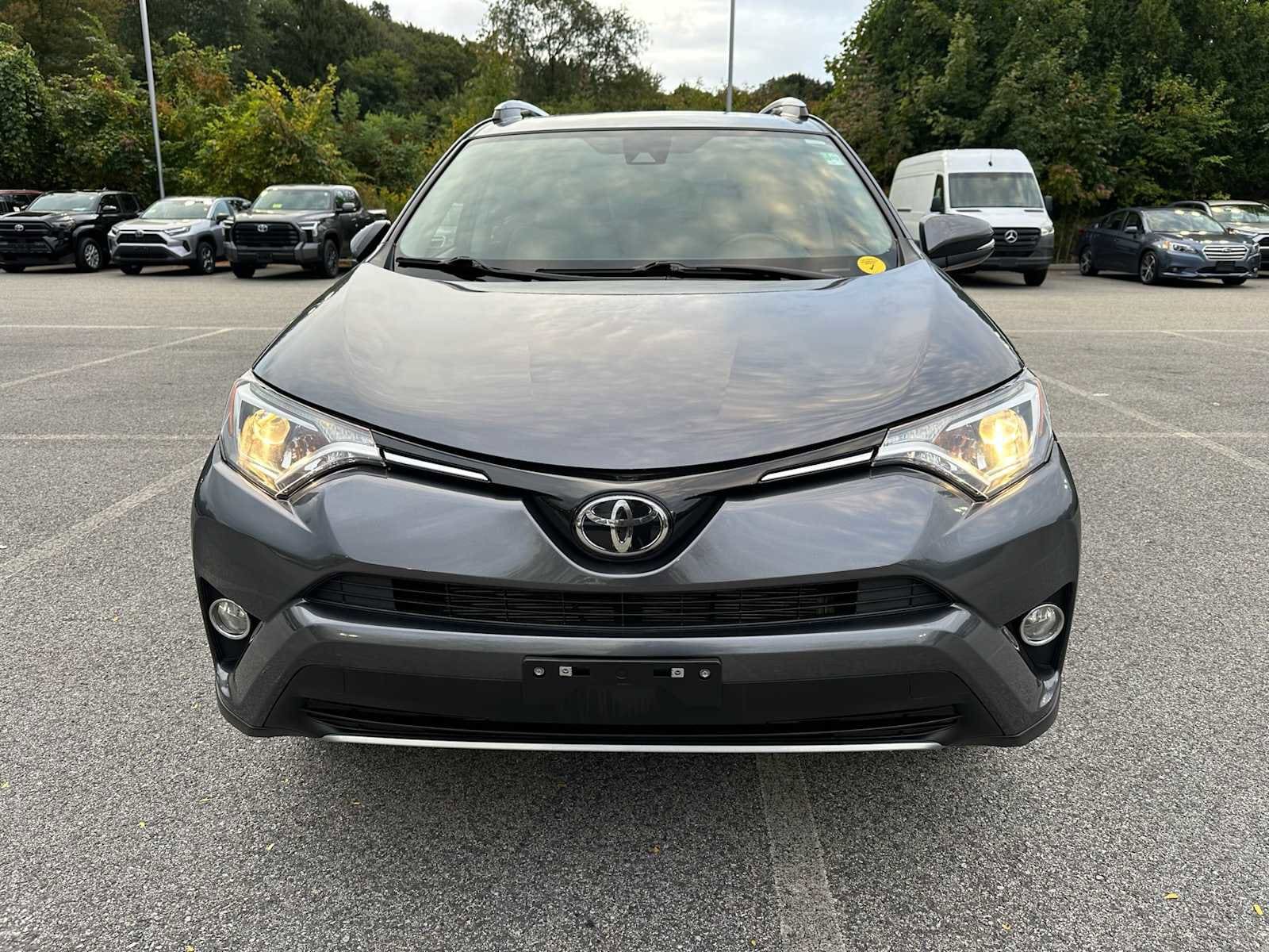 Used 2018 Toyota RAV4 XLE with VIN JTMRFREV5JD242114 for sale in Auburn, MA