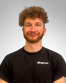 Staff member TREVOR ROGERS from d85010092f70