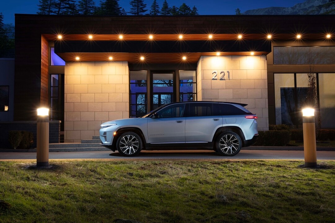 2025 Jeep Wagoneer S side view parked outside house at night