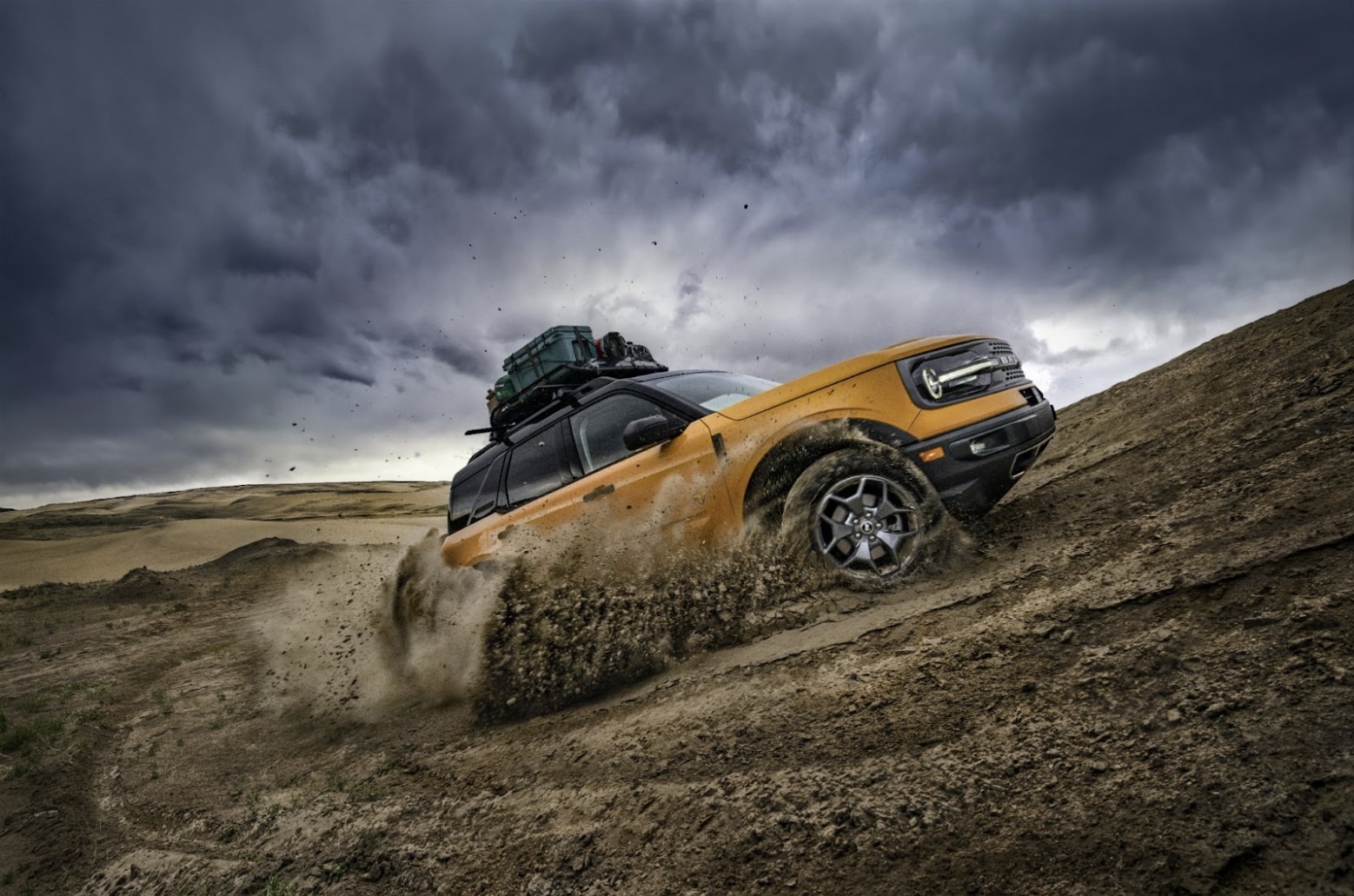 Yellow Bronco Sport drifting through Kentucky hills
