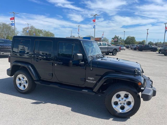 Used 2015 Jeep Wrangler Unlimited Sahara with VIN 1C4HJWEG2FL622910 for sale in Corydon, IN