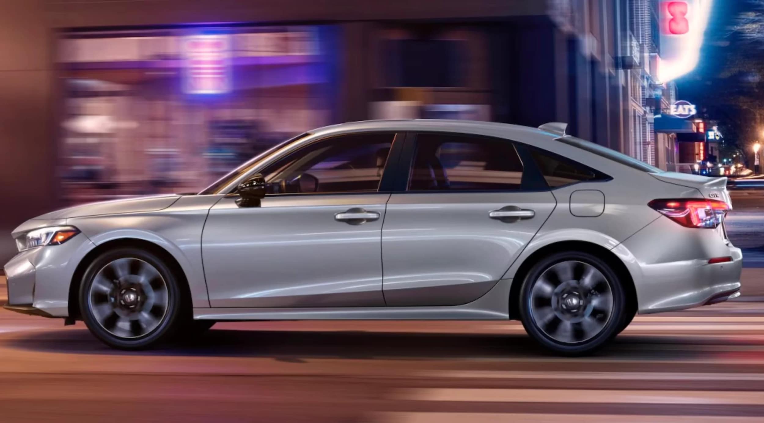 2025-Honda-Civic-Side-driving.png