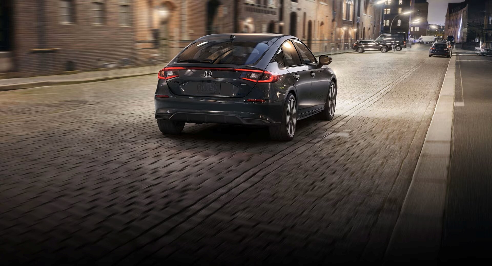 2026 Honda Civic Hatchback driving at night