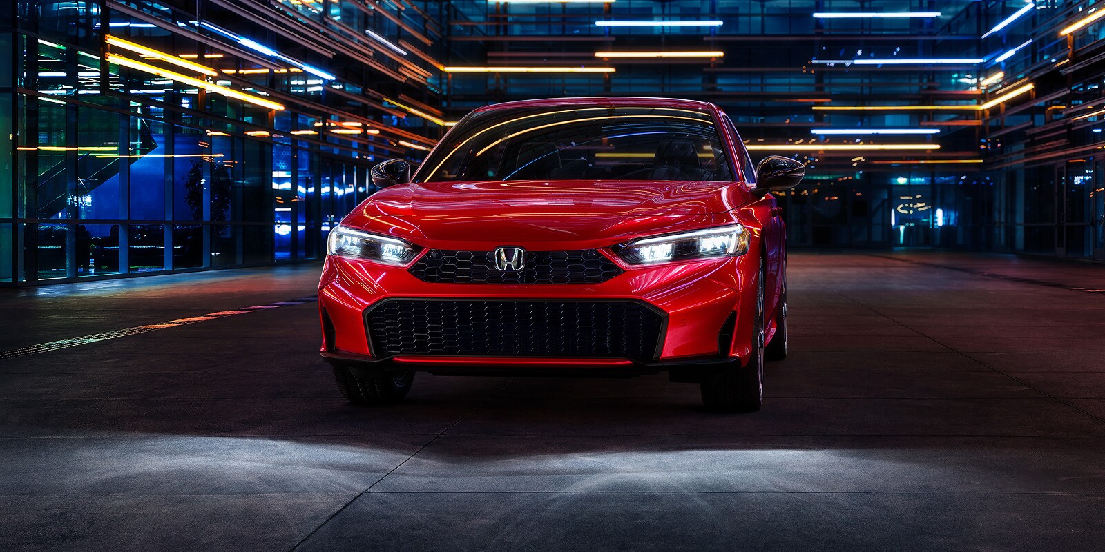 2026-honda-civic-sedan-sport-touring-hybrid-rallye-red-front-01.jpg