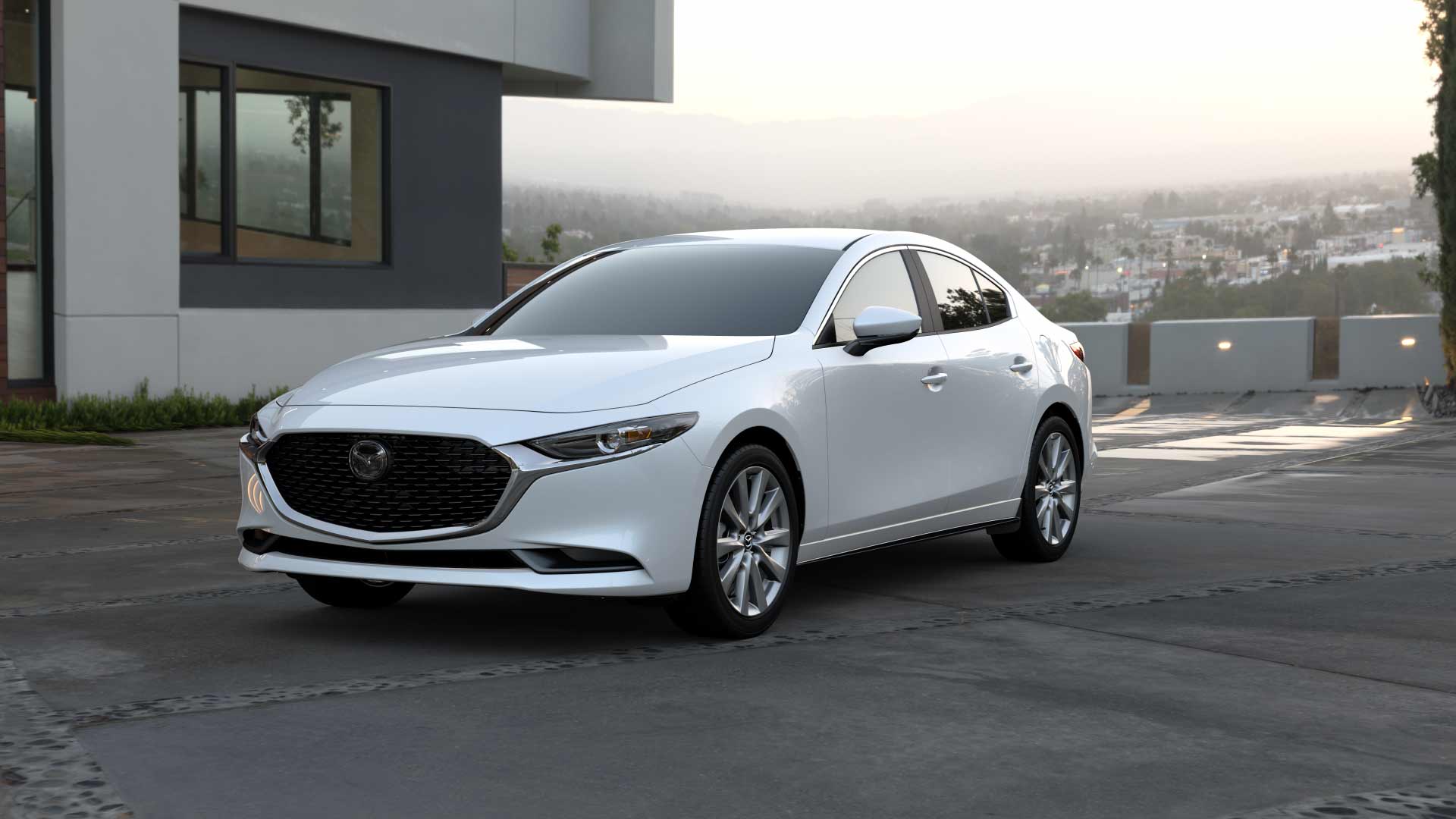 2021-mazda3-sedan-driveway-white.jpg