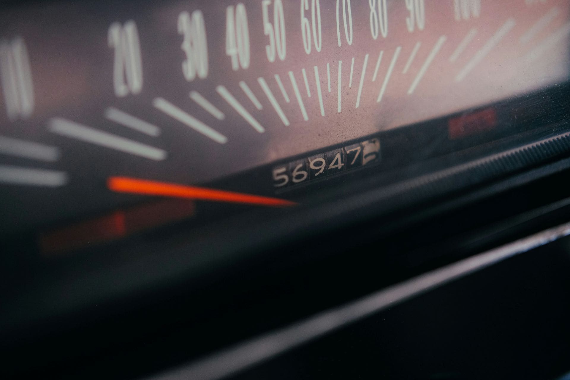 close-up photo of car speedometer and odometer