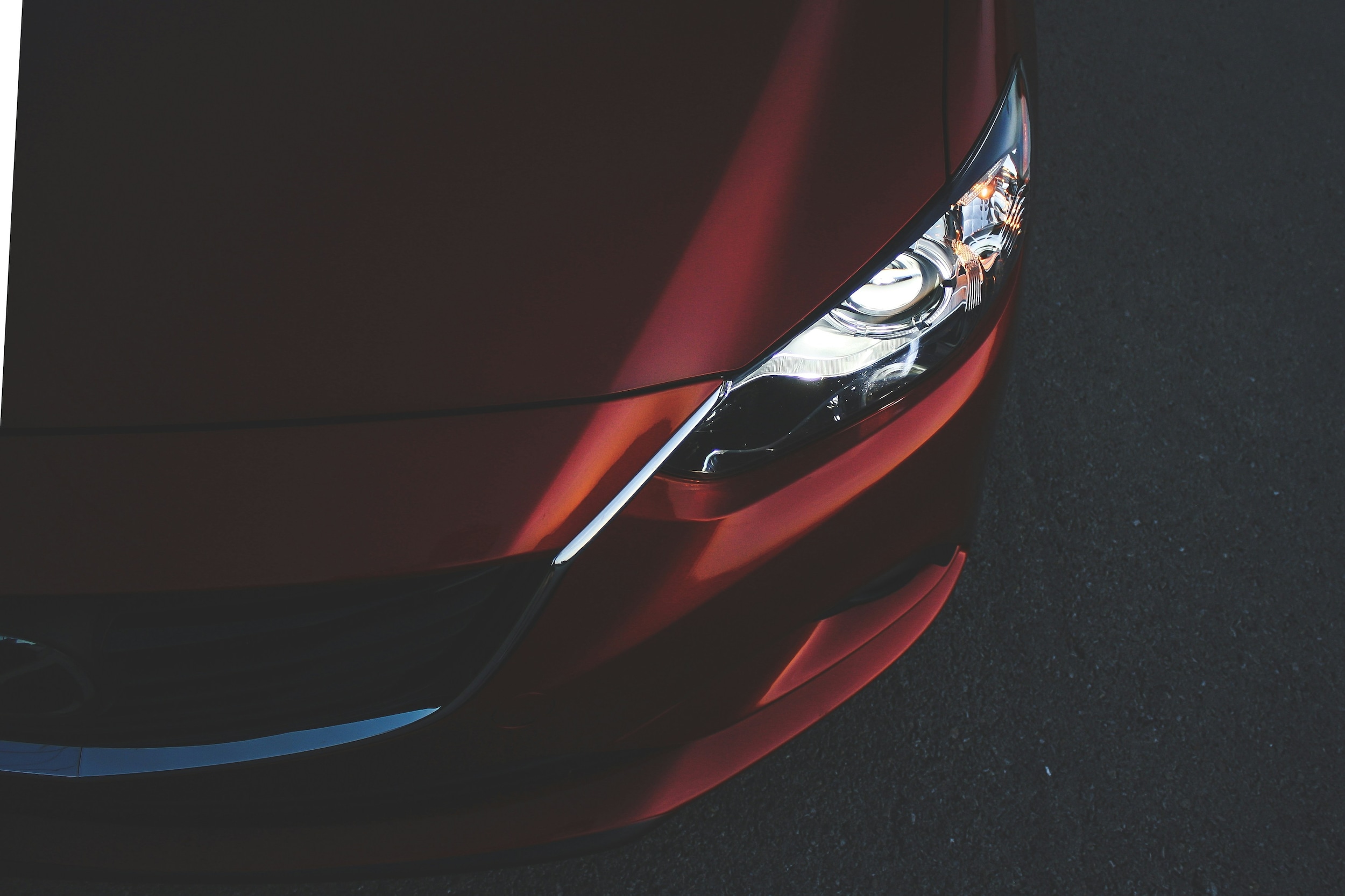 aerial photo of a red Mazda car hood