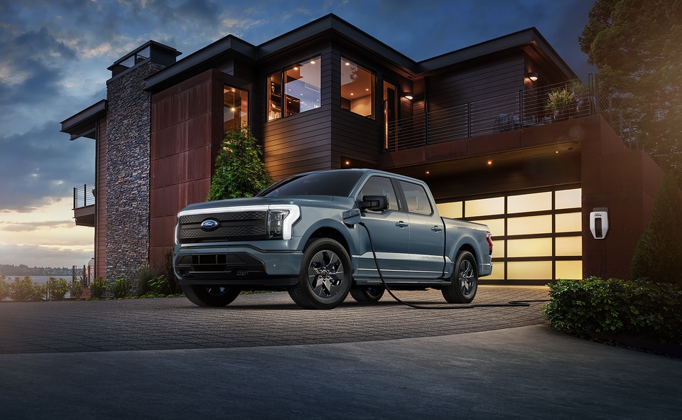  2025 Ford F-150 Lightning plugged in with home charger