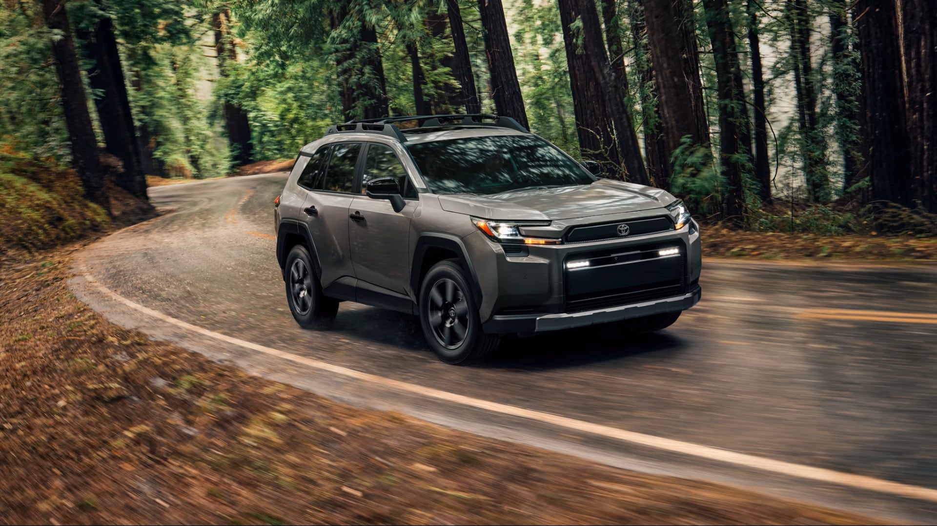 2026-Toyota-RAV4-driving-in-forest.png