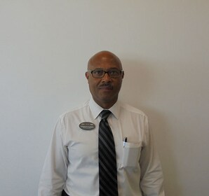 Staff member STANLEY EVANS from ID_0f192c430cc7