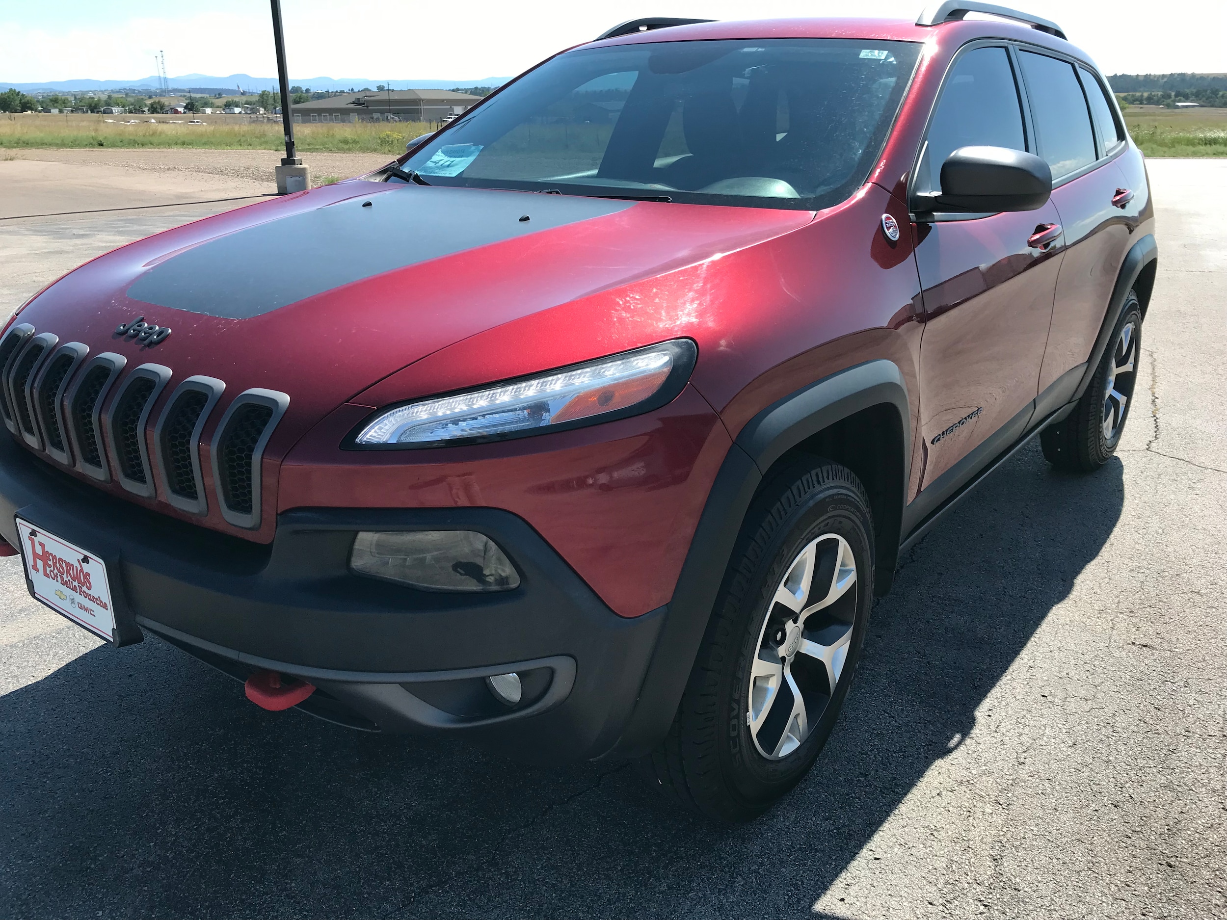 Used 2015 Jeep Cherokee Trailhawk with VIN 1C4PJMBB3FW634393 for sale in Belle Fourche, SD