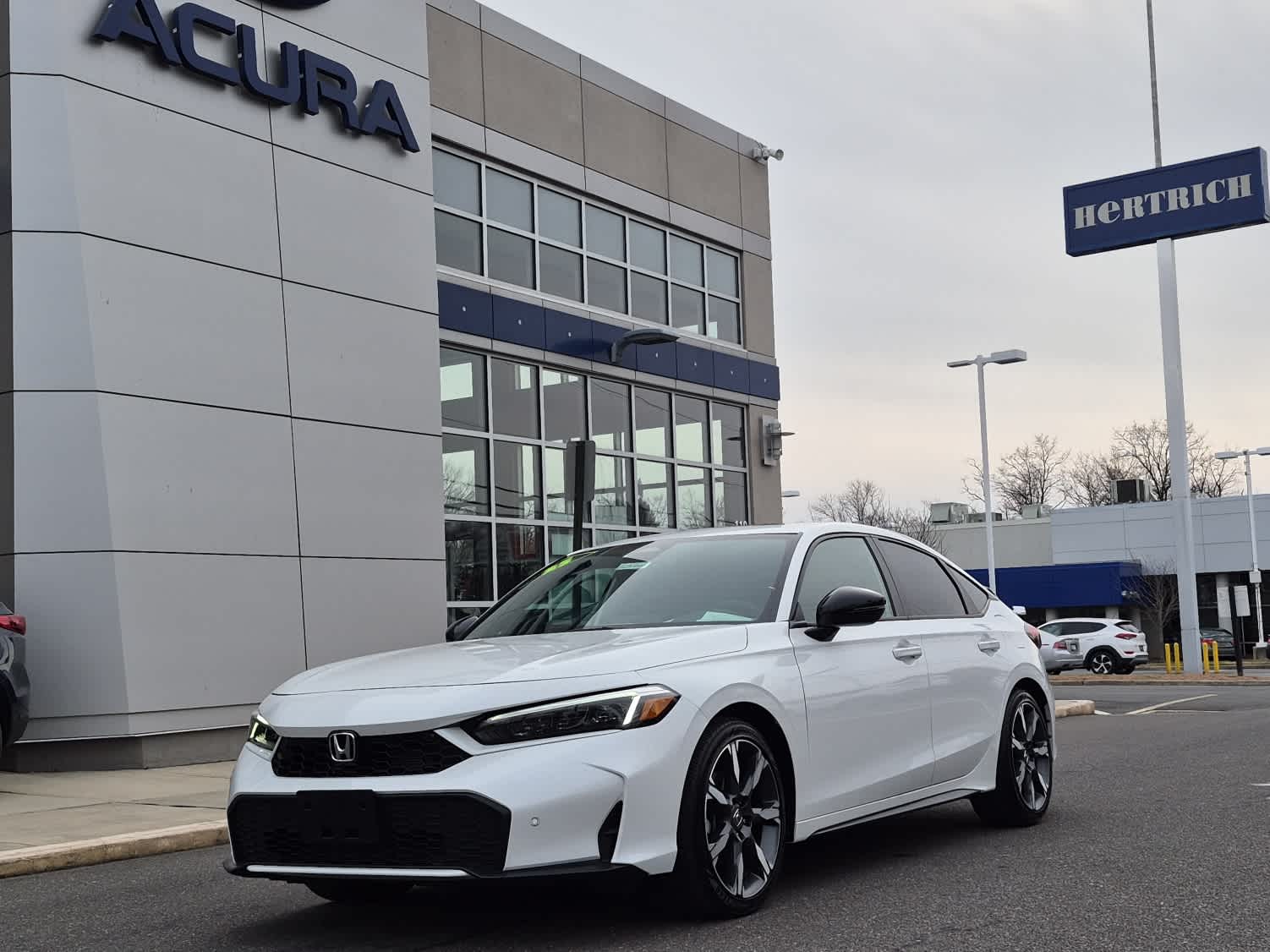 2025 Honda Civic Hatchback Sport Touring's photo