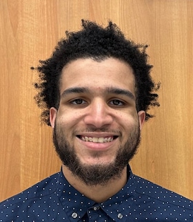 Staff member Toren Johnson from 4c7958205394