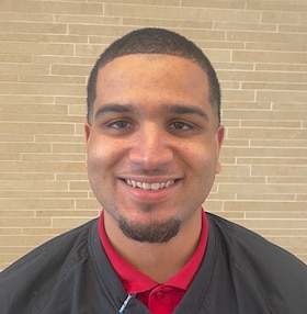 Staff member Toren Johnson from 4c7958205394