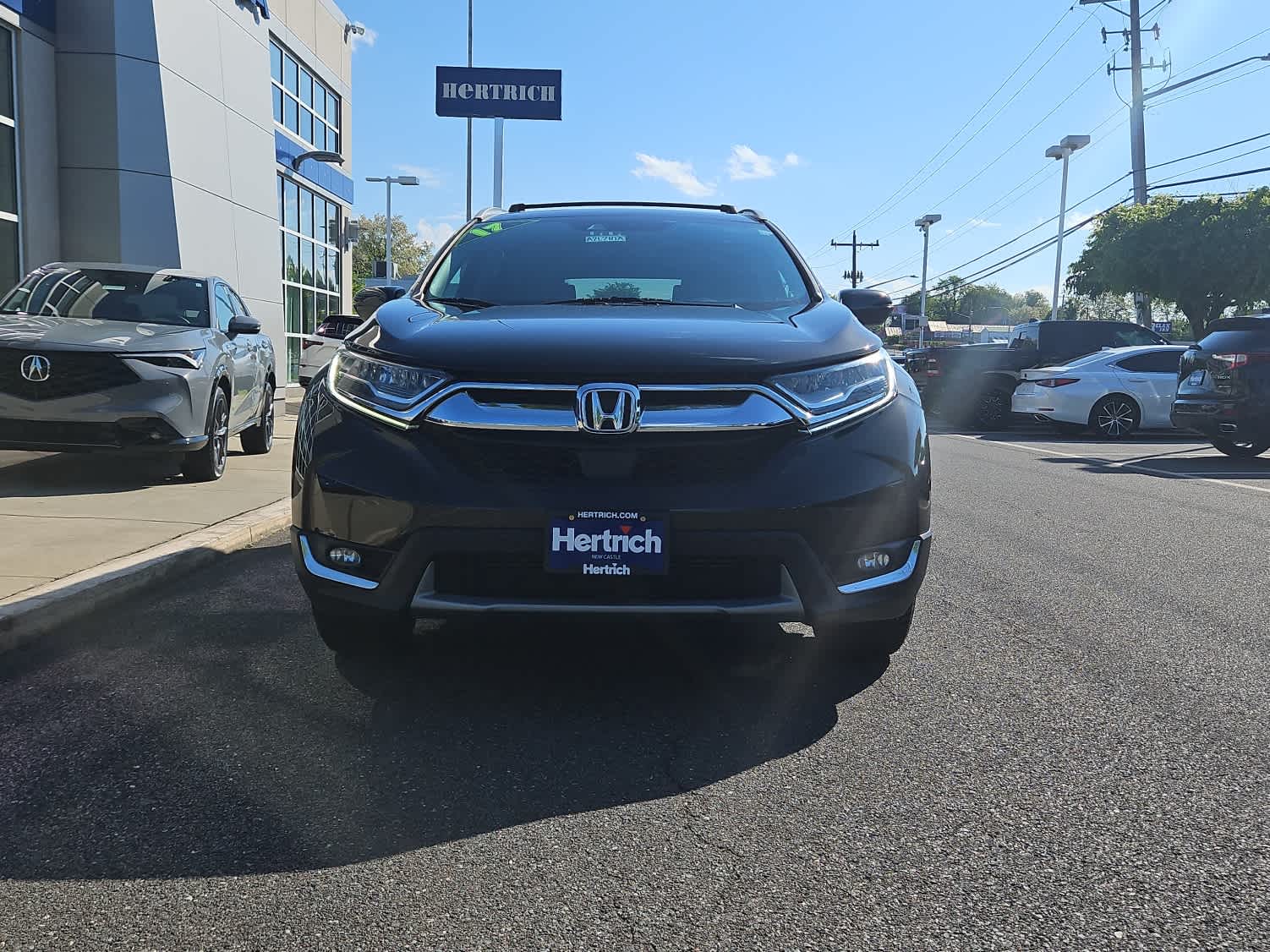 Used 2017 Honda CR-V Touring with VIN 2HKRW2H94HH660285 for sale in New Castle, DE