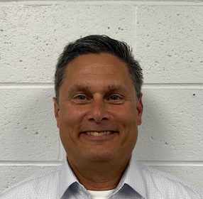 Staff member Anthony Tracey from 2f202f16c438