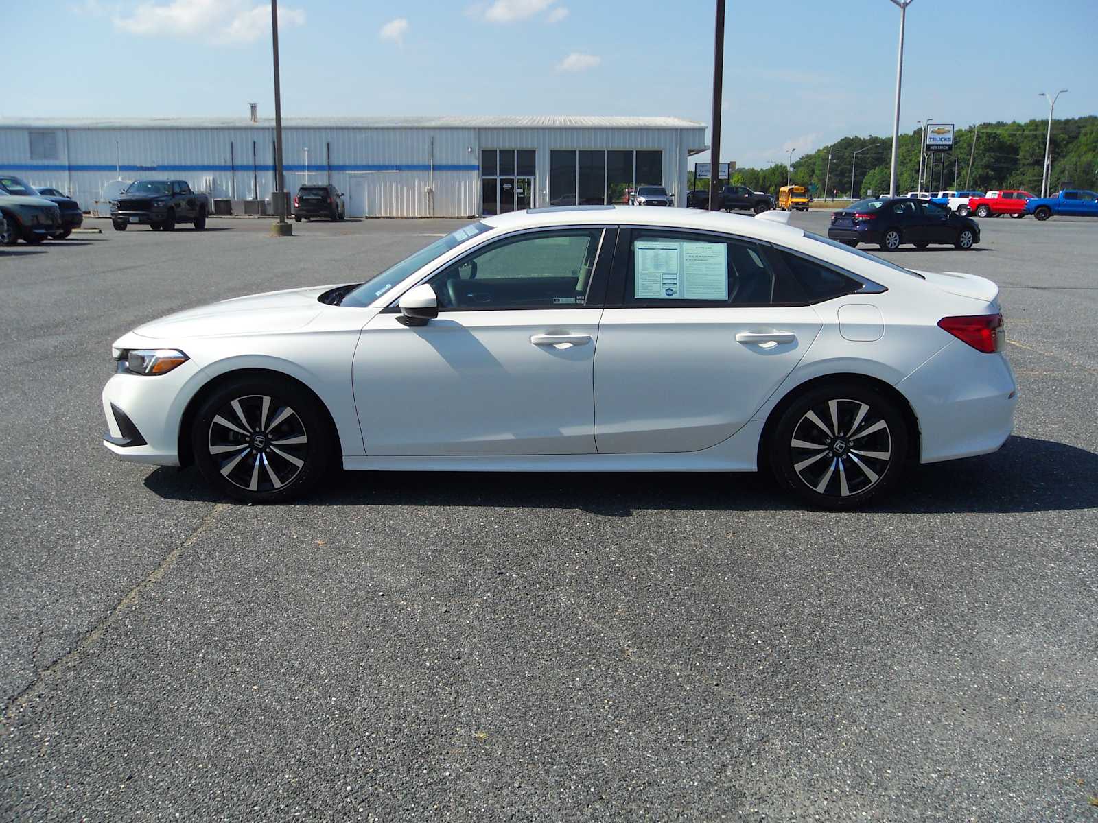 Used 2023 Honda Civic EX with VIN 2HGFE1F78PH321359 for sale in Easton, MD