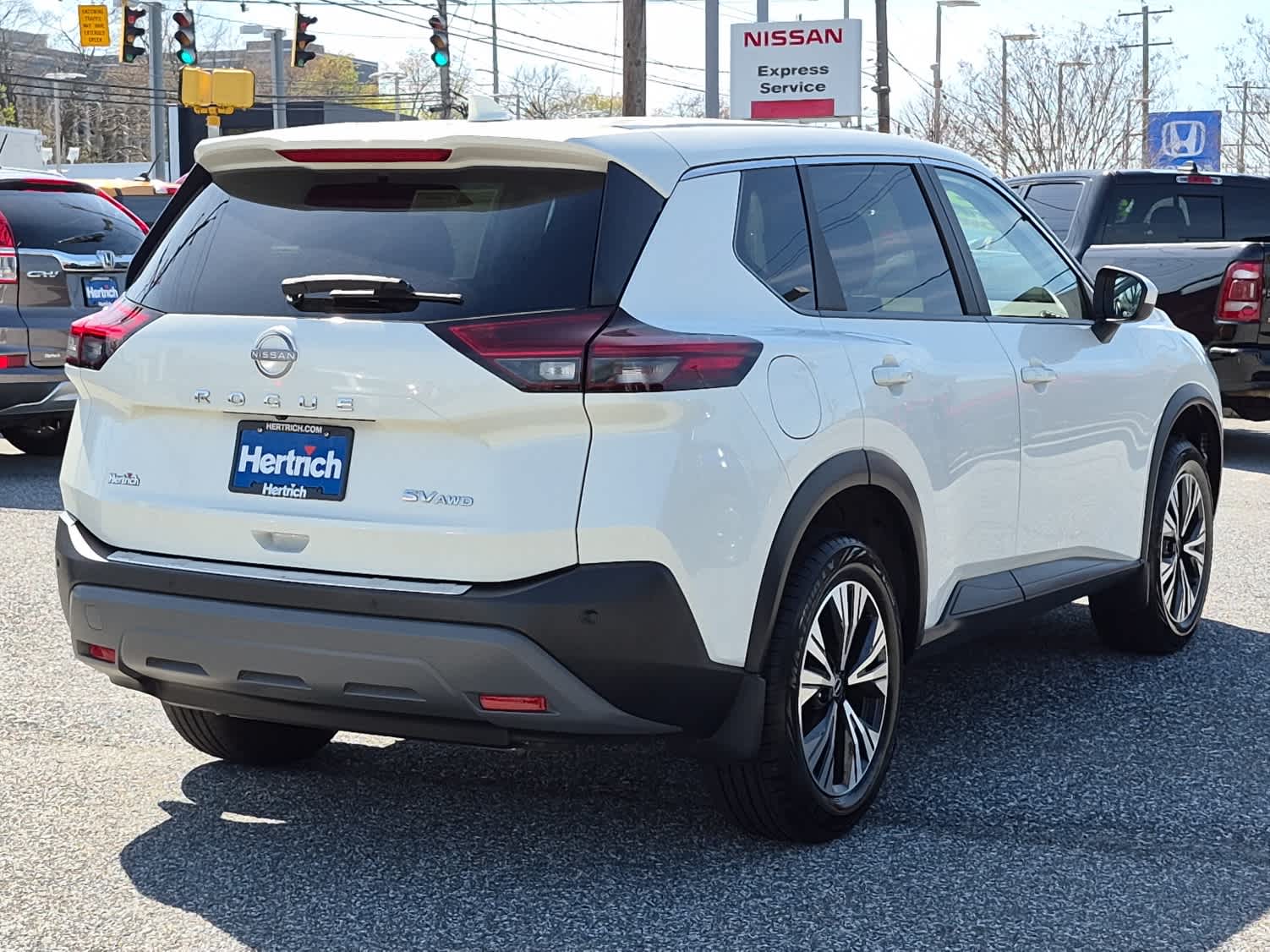 Pearl White Tricoat 2023 Nissan Rogue SV AWD SUV / Crossover All-Wheel Drive Continuously Variable Transmission