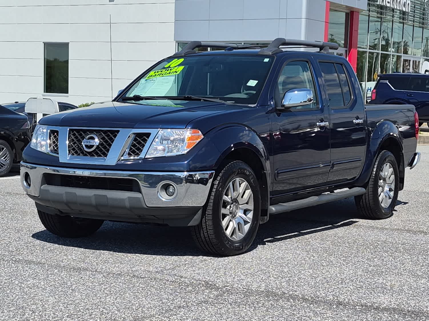 Navy Blue 2010 Nissan Frontier LE Crew Cab 4WD Pickup Truck Four-Wheel Drive Automatic