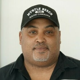 Staff member Travis Marshall from ID_9cd60a546d39