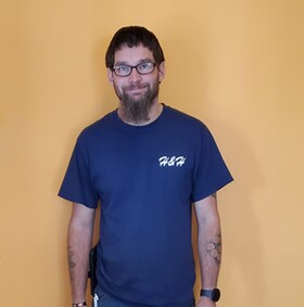 Staff member Andrew Glass from ID_9adebeed6697