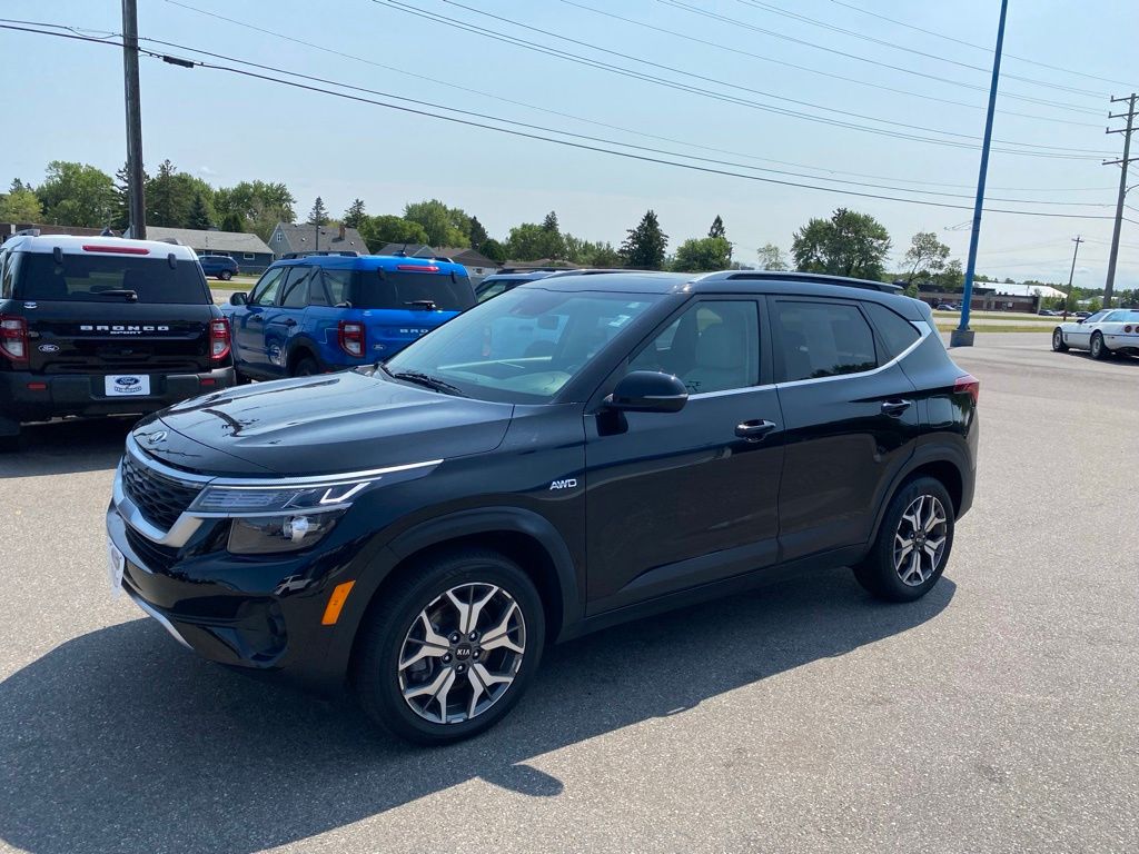 Used 2021 Kia Seltos EX with VIN KNDERCAA3M7213770 for sale in Hibbing, Minnesota